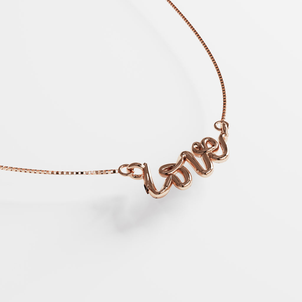 Collar Love de oro 18k con dije y cadena veneciana.